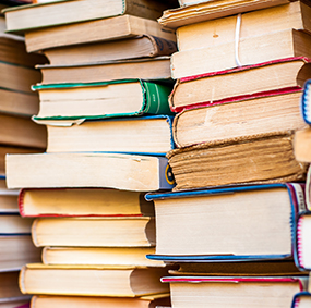 Books stacked on top of each other