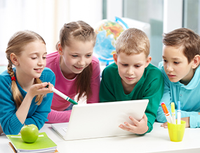 Students using tablets in class