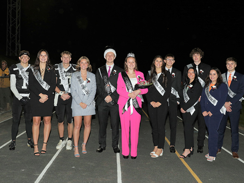 Homecoming Court on the football field