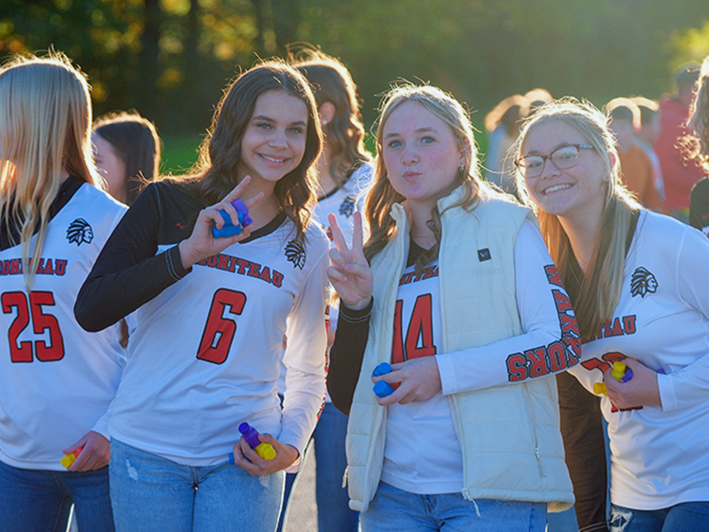 Group of happy girls posing for a picture