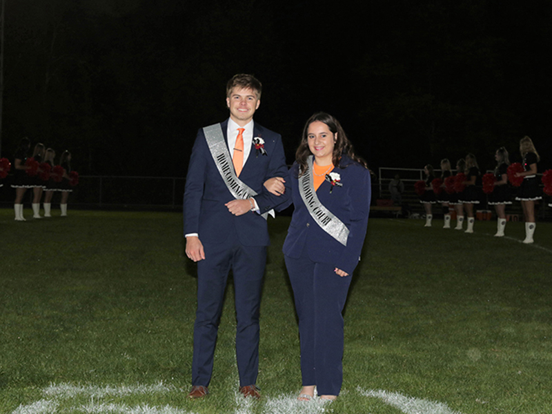 Homecoming couple wearing blue