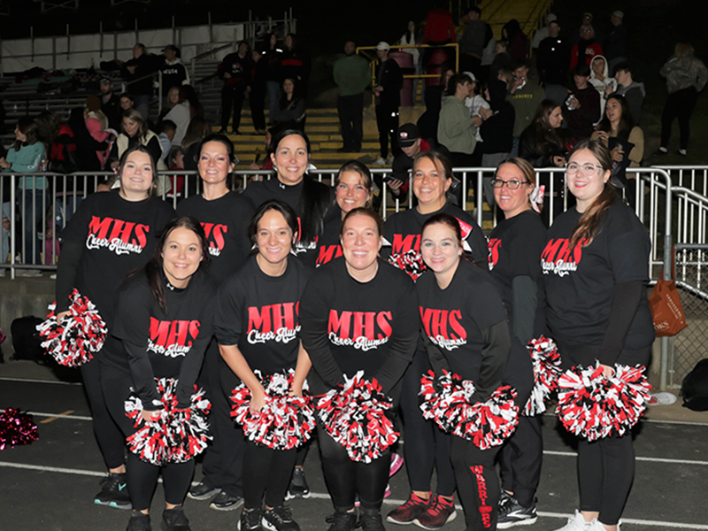 Cheer team posing for a group picture