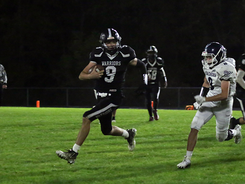 Football player running with the football