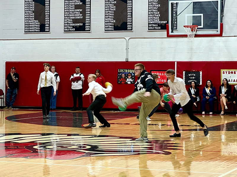 Students playing a game in the gym
